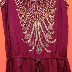 Sleeveless purple embroidered top